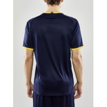 Craft Sport-Tshirt (Trikot) Progress 2.0 Graphic Jersey - leicht, funktionell und Stretchmaterial - navyblau/gelb Herren