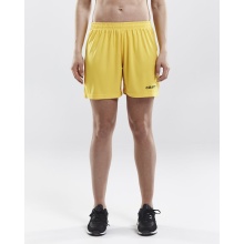 Craft Sporthose (Short) Squad Solid - ohne Innenshort, elastisches Material - gelb Damen