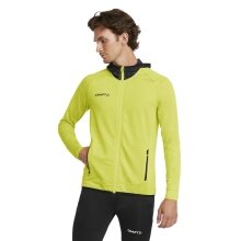 Craft Trainingsjacke Extend Full Zip (mit Reißverschlusstaschen, elastisches Material) gelb Herren