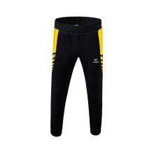 Erima Traingshose Six Wings Worker lang (100% Polyester, sportliche Passform) schwarz/gelb Herren