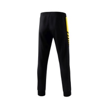 Erima Traingshose Six Wings Worker lang (100% Polyester, sportliche Passform) schwarz/gelb Jungen