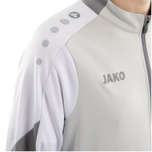 JAKO Trainingsanzug Polyester Dynamic (Jacke und Hose, sportiver Schnitt) hellgrau/weiss/grau Kinder