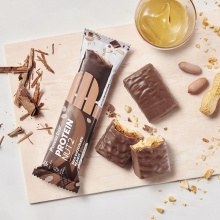 PowerBar Eiweissriegel Protein Nut2 Milchschokoladenkuvertüre/Karamell-Erdnuss 12x45g Box