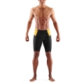 Skins Funktionshose TRI Brand Half Tight Short (für Triathlon, enganliegend, schnelltrocknend) schwarz/gelb Herren