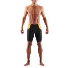 Skins Funktionshose TRI Brand Half Tight Short (für Triathlon, enganliegend, schnelltrocknend) schwarz/gelb Herren